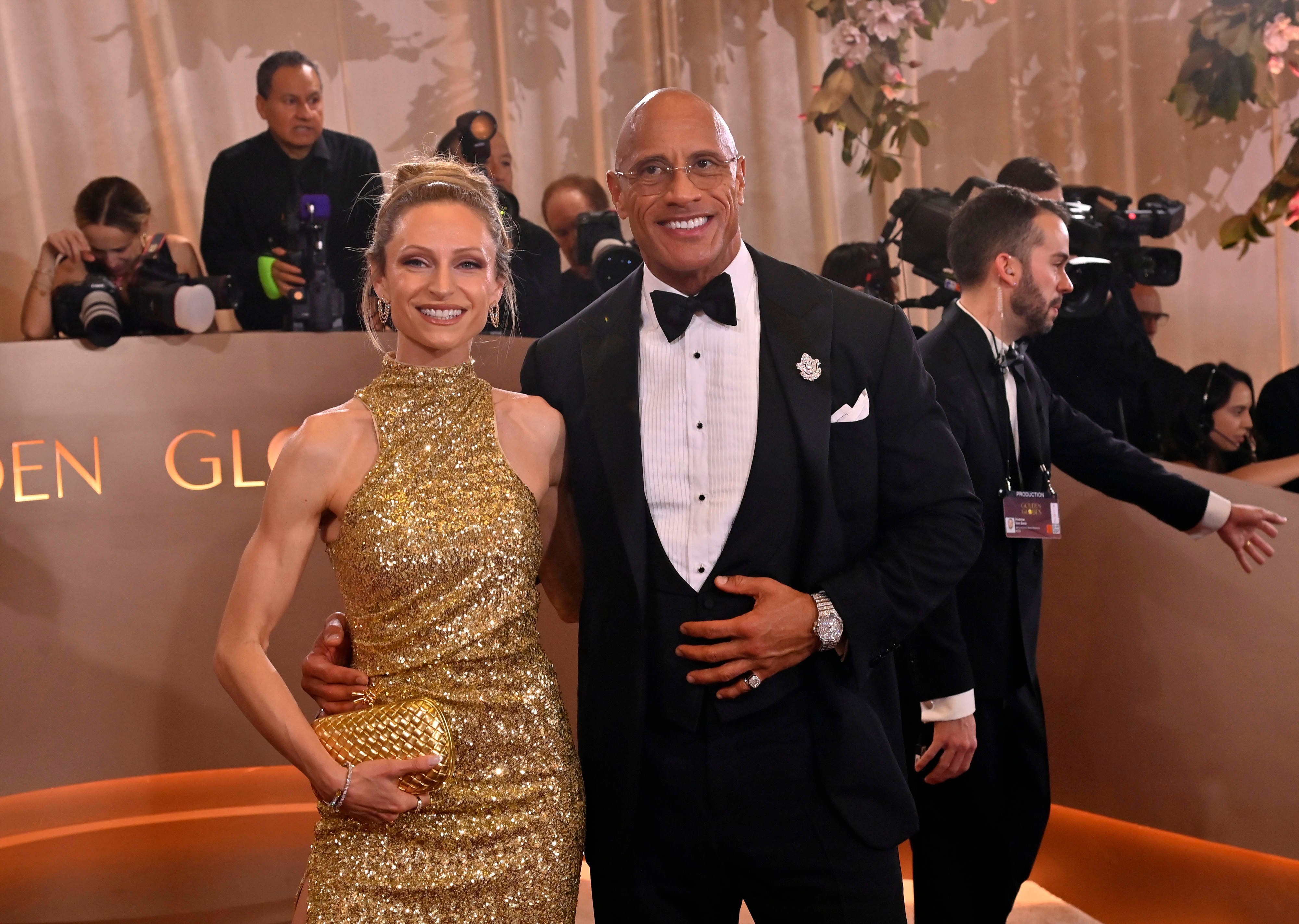Lauren Hashian and Dwayne Johnson attend the 83rd annual Golden Globe Awards at the Beverly Hilton Hotel in Beverly Hills 2026