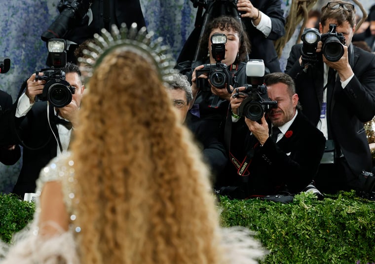 Photographers capture photos of Beyoncé when she arrives on the red carpet for the 2026 Met Gala