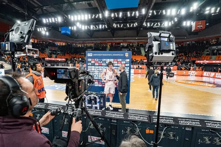 basketball-postgame-interview-arena-camera-crew