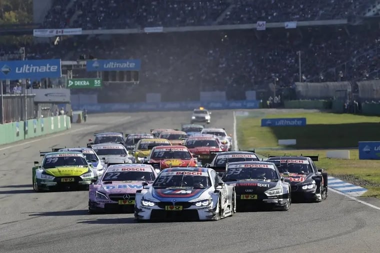 dtm-race-cars-on-track-competition-crowd