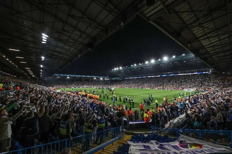 football-stadium-crowd-night-game-celebration