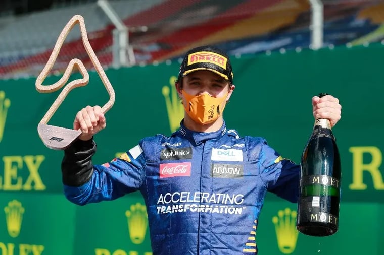 formula-1-driver-celebration-trophy-champagne