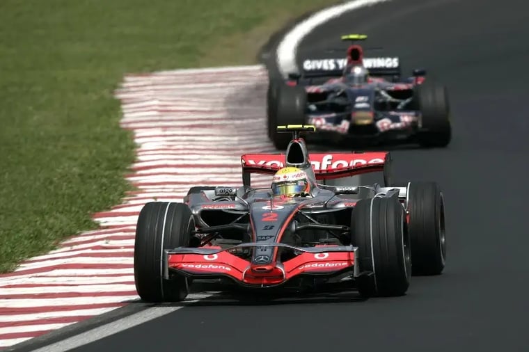 formula-1-race-cars-on-track-action