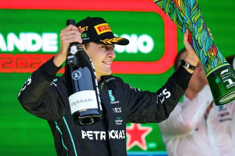 formula1-driver-celebrates-victory-podium