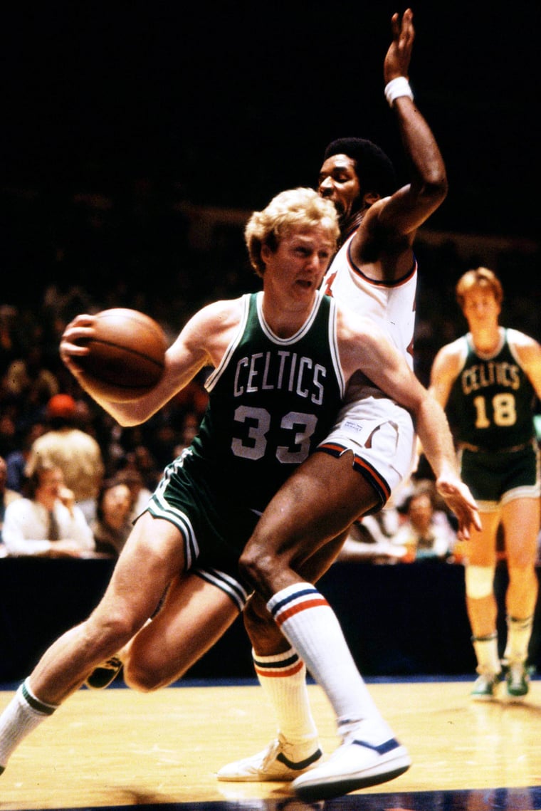 Larry Bird dribbles