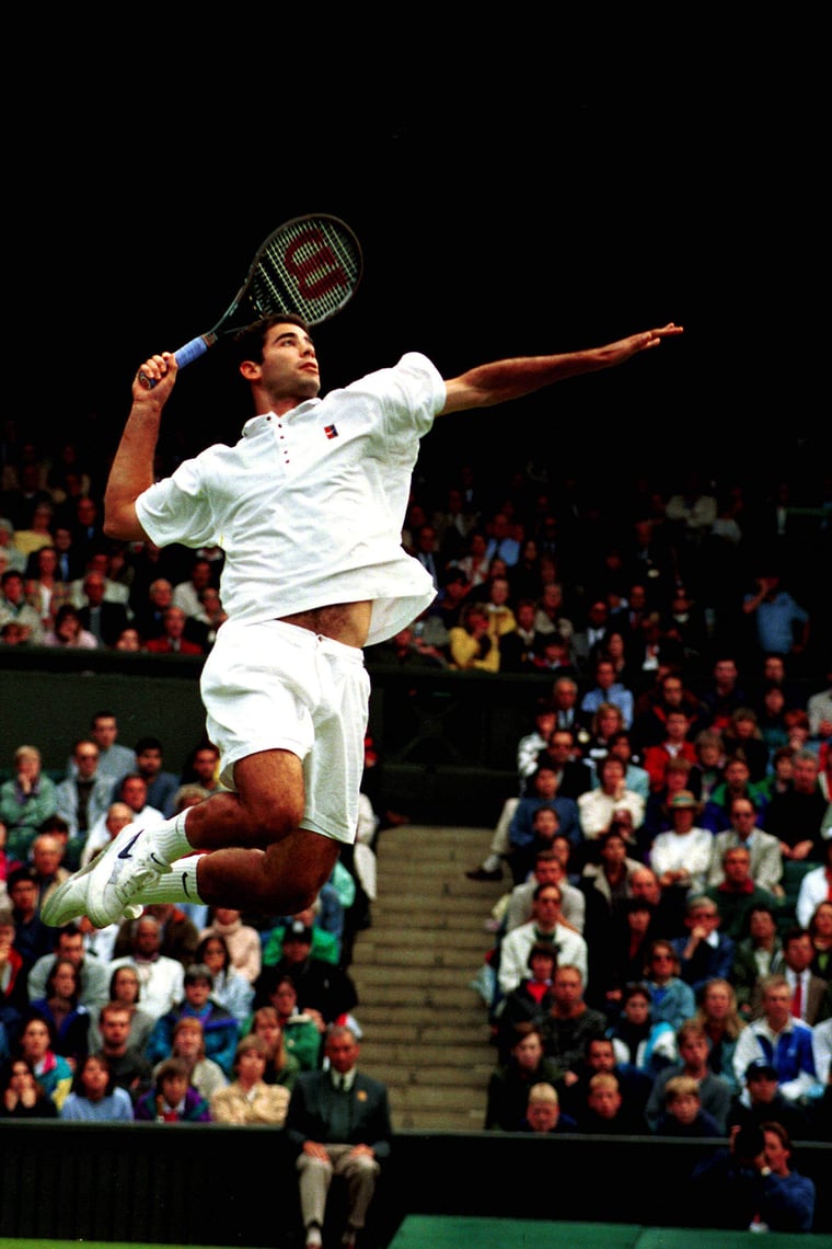 Pete Sampras hits the ball in the air tennis All England Championships 1996