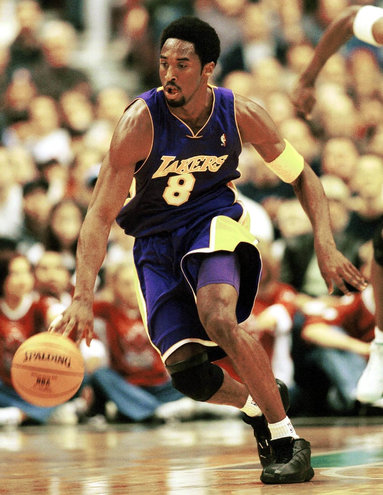 Kobe Bryant dribbles