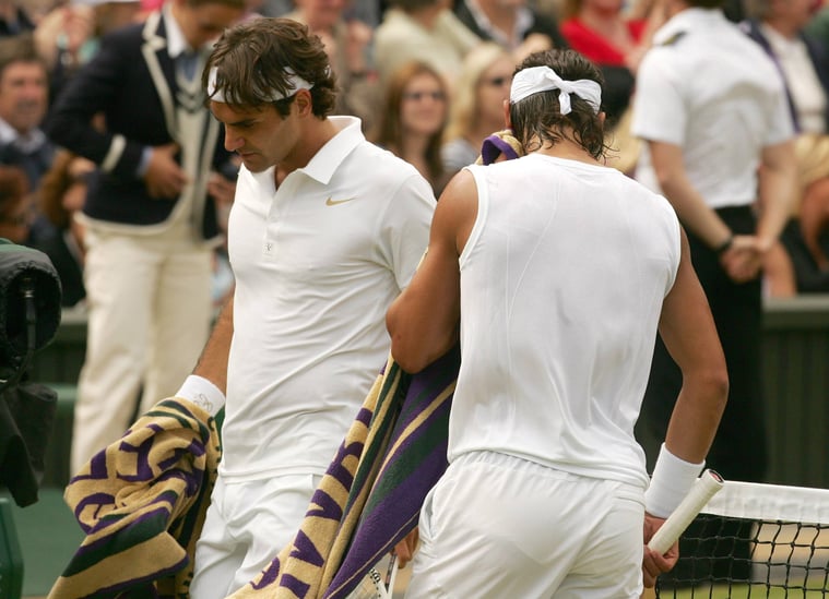 Roger Federer (Switzerland, left) and Rafael Nadal (Spain) drying themselves