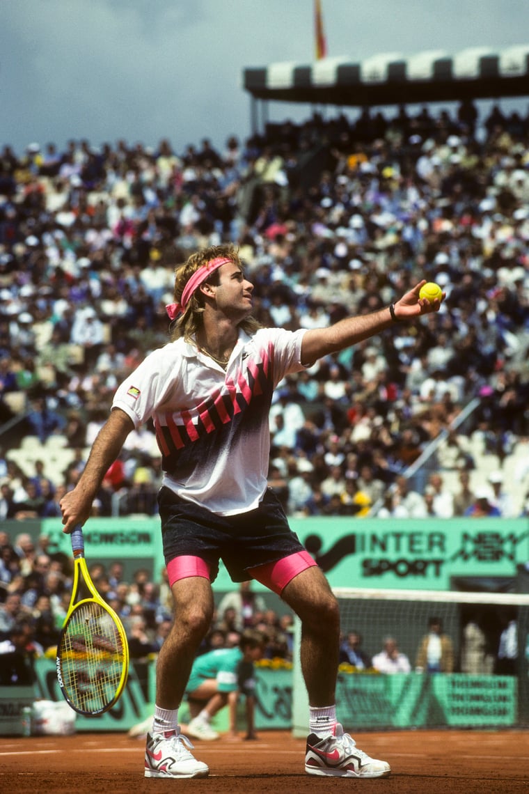 Andre Agassi serves French Open 1990 tennis