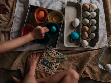 kids decorating easter eggs image