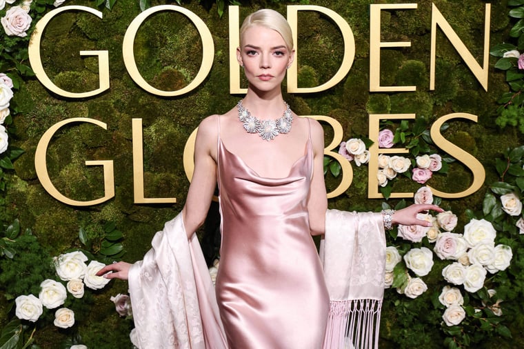 IMAGO / Avalon.red / Xavier Collin | Anya Taylor-Joy wearing archive Dior, Jimmy Choo shoes, and Tiffany and Co. jewelry arrives at the 82nd Annual Golden Globe Awards.