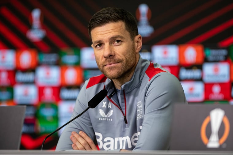 Photo of Leverkusen Coach Xabi Alonso during a press conference.