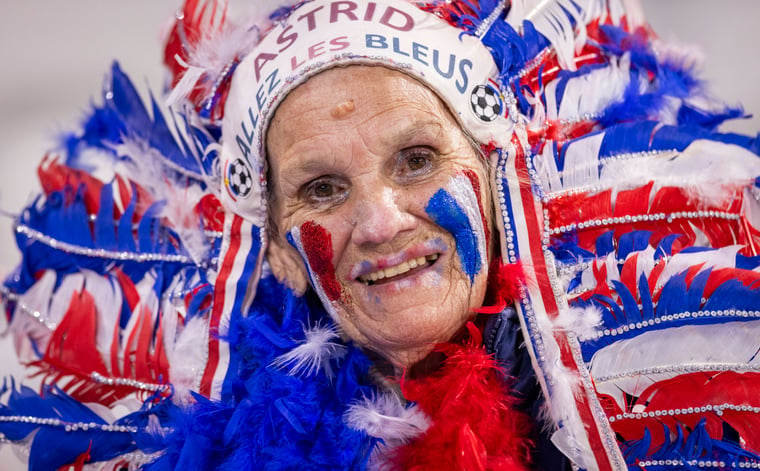 woman in red white blue costume