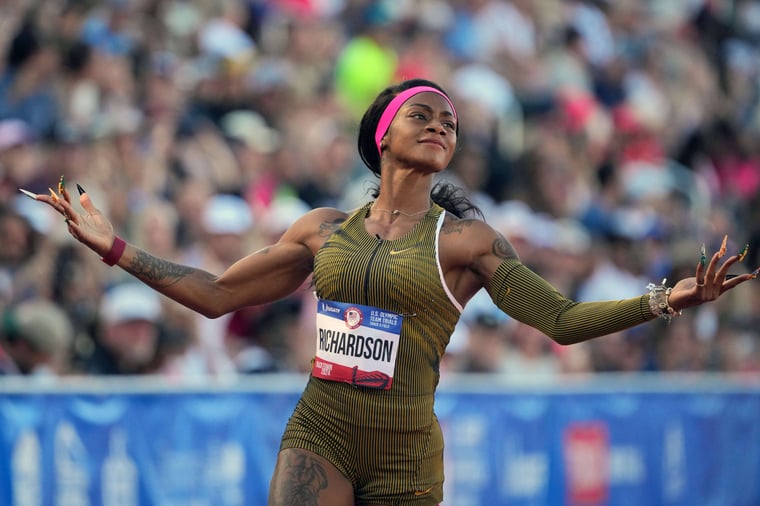 Sha'Carri Richardson celebrates