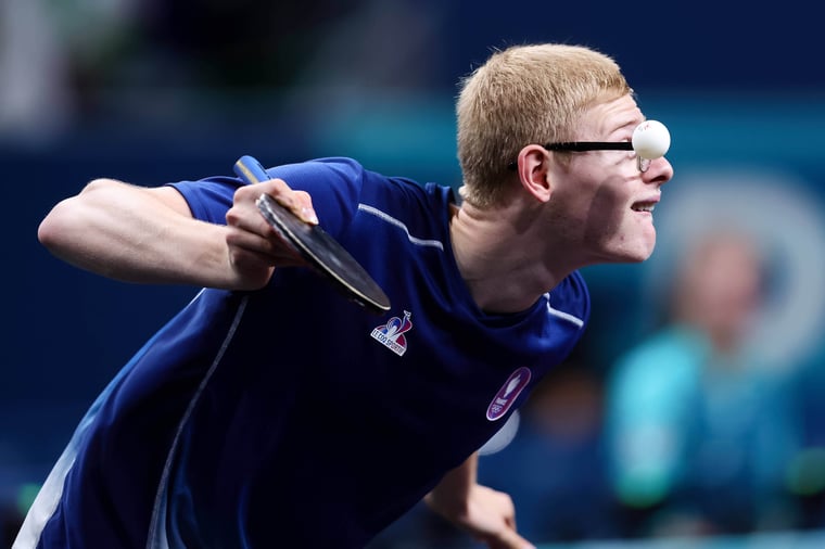 Felix Lebrun serves table tennis Paris 2024