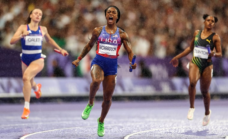 Sha'Carri Richardson gold medal celebrate Paris 2024