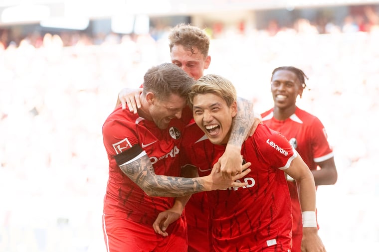 Ritsu Doan Lukas Kuebler celebrate SC Freiburg goal