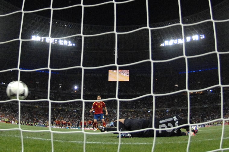 Cesc Fabregas from Spain scores the goal at the penalty shoot-out EURO 2012