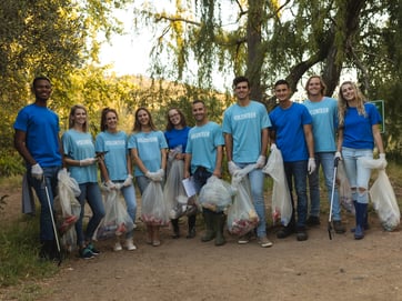 volunteers cleaning up forest in the countryside image