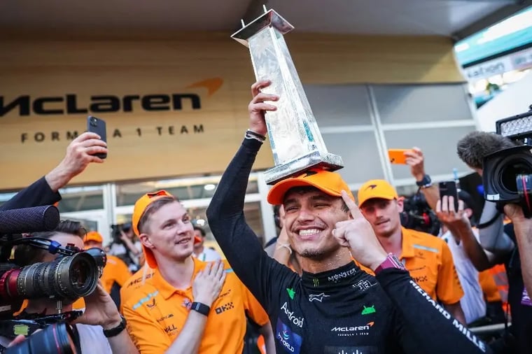 mclaren-driver-celebrating-trophy-victory