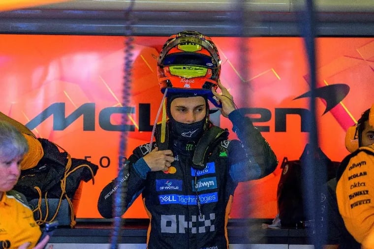 mclaren-f1-driver-prepares-race-helmet-pitstop