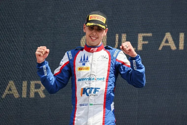 race-car-driver-celebrating-podium-victory