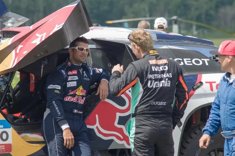 race-car-drivers-discussing-strategy