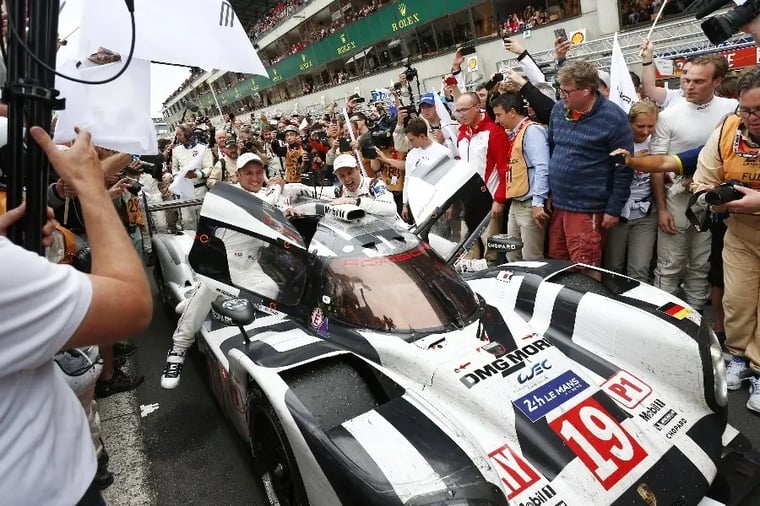 race-car-victory-celebration-le-mans-crowd