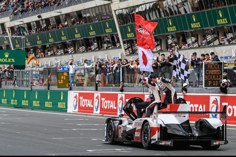 race-car-victory-celebration-le-mans-track