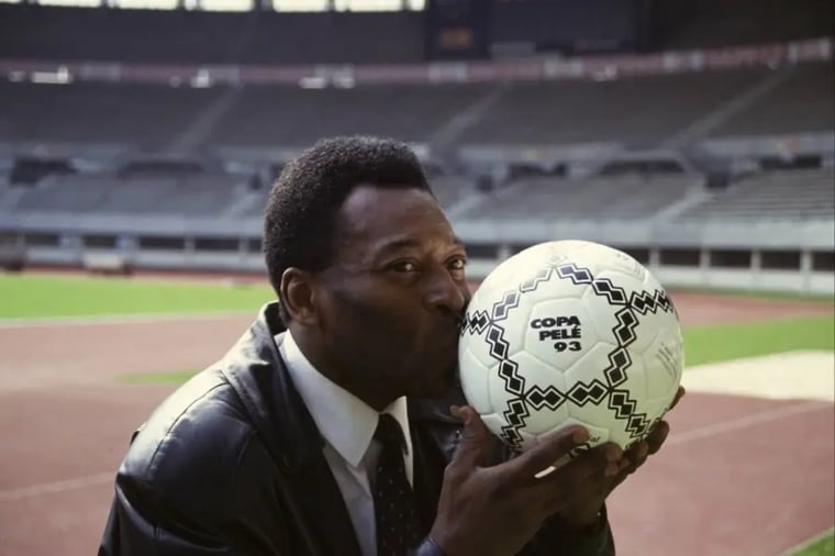soccer-legend-kissing-copa-pele-ball-stadium