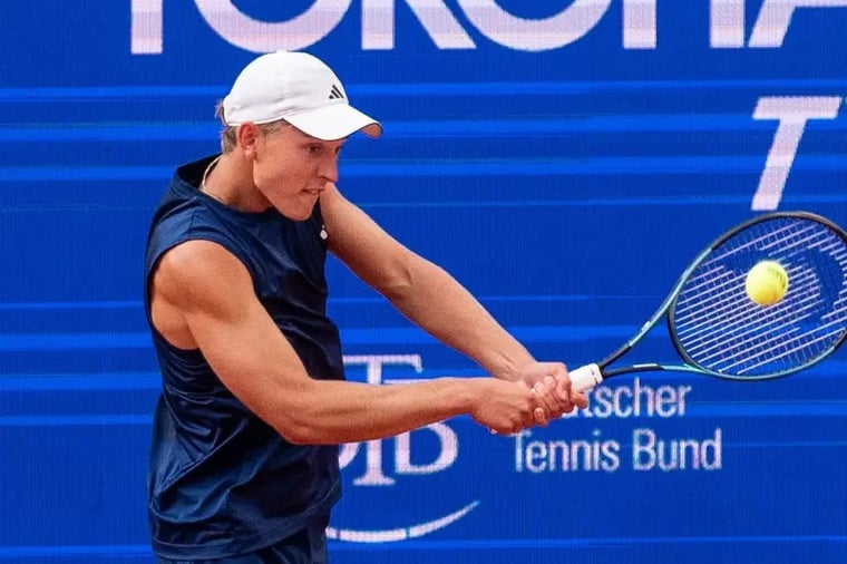 tennis-player-backhand-swing-action-shot