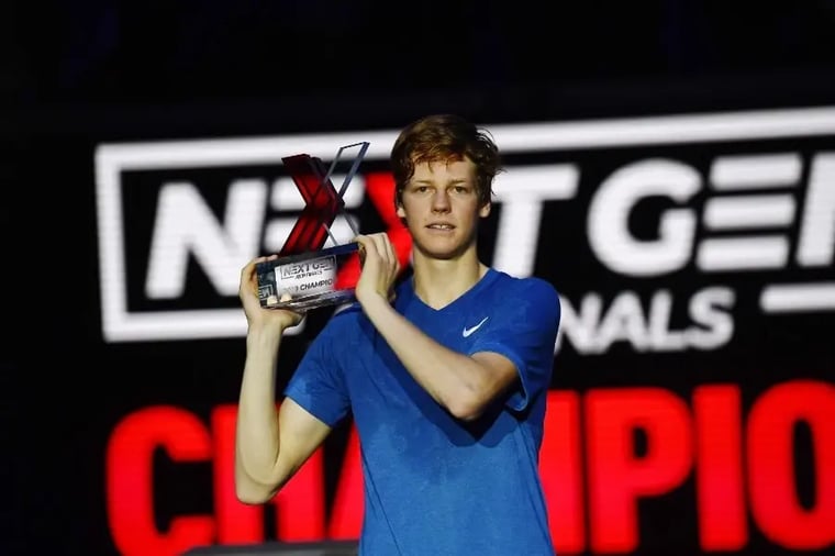 tennis-player-holding-trophy-next-gen-finals