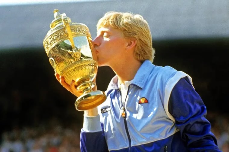 tennis-player-kissing-trophy-victory-celebration