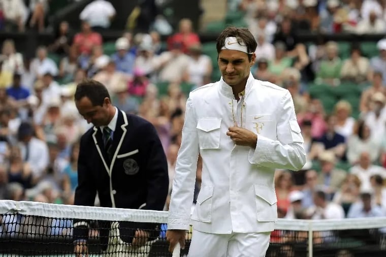tennis-player-wimbledon-white-jacket-crowd