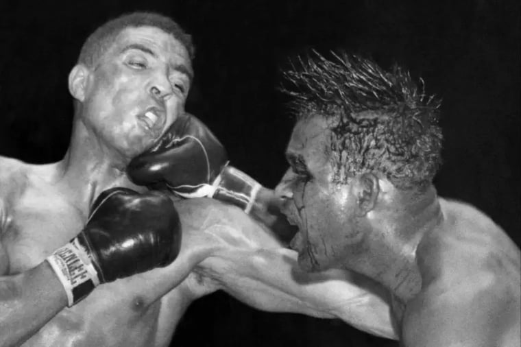 vintage-boxing-match-punch-action-shot