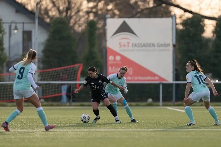 women-soccer-match-action-play-field