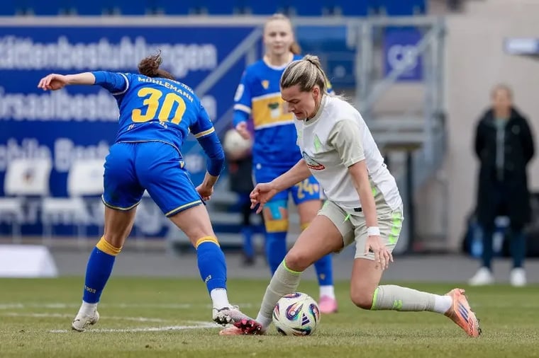women-soccer-match-action-shot