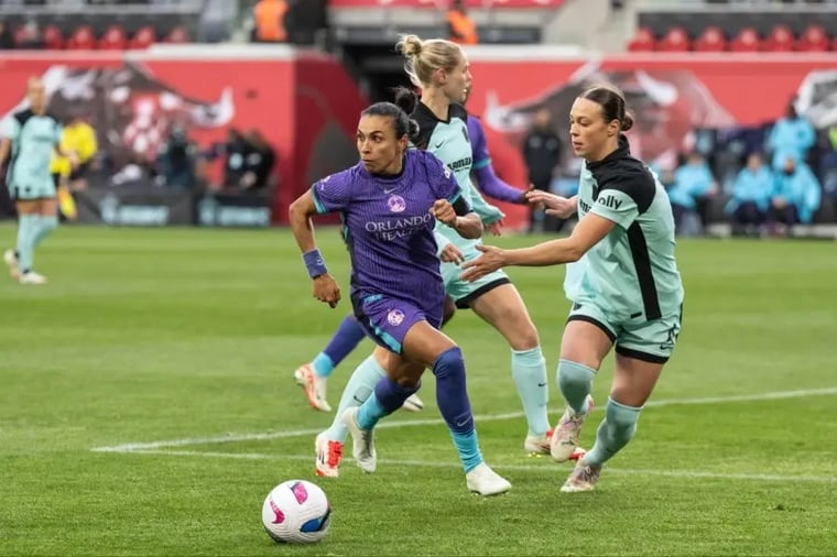 women-soccer-match-orlando-team-action