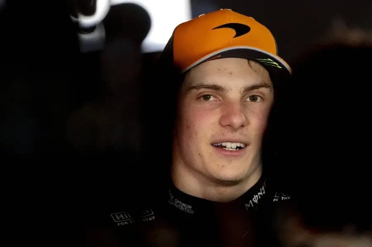 young-man-orange-cap-smiling-portrait